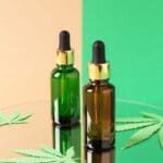 Natural CBD oil with hemp leaves and wellness products promoting relaxation and health benefits